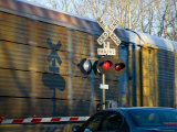 Warning Lights and Gates Save Lives at Train Crossings, Silver Spring, Maryland Photographic Print by Stephen St. John
