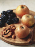 Apples, Prunes and Almonds on Wooden Board Photographic Print by Michael Paul