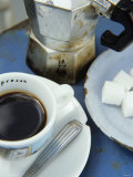 A Cup of Espresso, Sugar Cubes and Espresso Pot Fotografie-Druck von Véronique Leplat