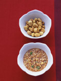 Honey Peanut Sauce and Peanuts in Small Bowls Photographic Print by Peter Medilek
