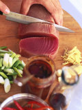 Slicing Tuna Fillet Photographic Print by Peter Medilek