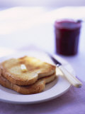 Two Slices of Toast with Butter and Strawberry Jam Photographic Print by Jonathan Syer