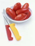 Plum Tomatoes in a Dish, Two Kitchen Knives Photographic Print by Peter Medilek