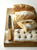 Assorted Loaves on Wooden Chopping Board Lámina fotográfica por Michael Paul