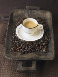 A Cup of Espresso on a Wooden Bowl with Coffee Beans Photographie par Anita Oberhauser
