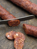 Slicing Chorizo Photographic Print by Winfried Heinze