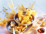 Lots of Different Types of Pasta in Dishes, Tomato Sauce Lámina fotográfica por Ulrike Holsten