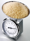 Brown Rice on Kitchen Scales Photographic Print