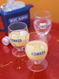 Two Glasses of Pernod with Ice and Jug of Ice Cubes Photographic Print by Peter Medilek