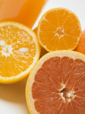 Glass of Orange Juice, Grapefruit and Oranges Photographic Print