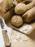 Baguettes & Wholemeal Rolls in Wooden Scoop in Front of Tin Loaf Photographic Print