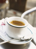 Cup of Espresso on Table in Cafe Photographic Print