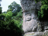 Buddha Image on the Cliff Photographic Print