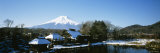 Houses in Front of a Mountain, Mt Fuji, Honshu, Japan Photographic Print by Panoramic Images 