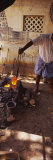 Man Standing Near a Stove and Melting Bronze in a Container, Thanjavur, Tamil Nadu, India Photographic Print by Panoramic Images 