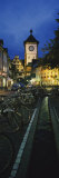 Bicycles Parked Along a Stream Near a Road, Freiburg, Baden-Wurttemberg, Germany Fotografie-Druck von Panoramic Images 