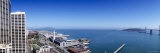 Buildings at the Waterfront, Bay Bridge, San Francisco, California, USA Lámina fotográfica por Panoramic Images
