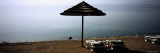 Patio Umbrella on the Beach, Dead Sea, Jordan Lámina fotográfica por Panoramic Images