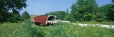 Cedar Covered Bridge in a Forest, Madison County, Iowa, USA Photographic Print by Panoramic Images 