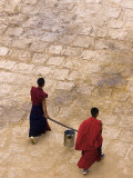 Monks Carrying Yak Butter, Ganden Monastery, Tagtse County, Tibet Photographic Print by Michele Falzone