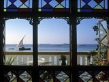 Dhow Through Window, Zanzibar, Tanzania Fotografie-Druck von Peter Adams
