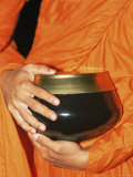 Thailand, Bangkok, Detail of Monk Holding Alms Bowl Photographic Print by Steve Vidler Thailand, Bangkok, Detail of Monk Holding Alms Bowl Photographic Print by Steve Vidler
