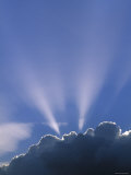Sun Rays Through Clouds Photographic Print by Jon Arnold