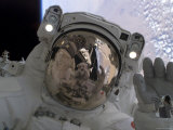 Astronaut Participates in Extravehicular Activity Photographic Print by Stocktrek Images 