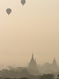 Hot Air Balloons Flying over the Ancient Temples of Bagan, Bagan, Myanmar Photographic Print by Jane Sweeney