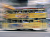 Tram, Hong Kong, China Photographic Print by Walter Bibikow