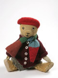 Teddy Bear Wearing Knitted Hat, Scarf, Jacket and Trousers Photographie