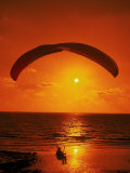 Paragliding Over Sea at Sunset Photographic Print