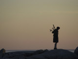 Bagpipe Player, Nova Scotia, Canada Photographic Print by Keith Levit