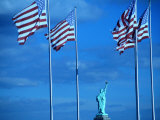Statue of Liberty and American Flags Photographic Print by Peter Adams