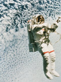 Astronaut Walking in Space Photographic Print by David Bases