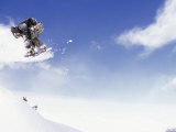 Man on Snowboard Jumping Photographic Print by Kurt Olesek