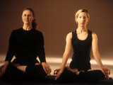 Two Women in Traditional Yoga Position Photographie par Jim McGuire