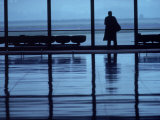 Homesick Executive at Airport Terminal Fotografisk trykk av Kevin Beebe Homesick Executive at Airport Terminal Fotografisk trykk av Kevin Beebe