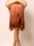 Nude Woman with Long Red Hair in Graceful Pose Photographie par Derek Cole