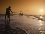 Silhouette of Father and Son Fishing Photographic Print by Peter Langone