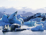 Icebergs Calved from Breidamerkurjokull Glacier Floating in Lake Jokulsarlon, Iceland Photographic Print by Richard Packwood