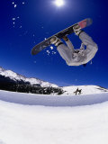 Snowboarder Upside Down in Midair Photographic Print by Kurt Olesek