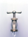 Water Coming Out of a Faucet Photographic Print by Chris Rogers