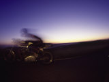 Blurred Motion of Man on Motorcycle Photographic Print by David Wasserman