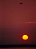 Sunset & Plane Over the Pacific Ocean Photographic Print by Hal Gage