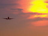 Commercial Airplane at Sunset Photographic Print by Mitch Diamond
