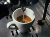 Machine Pouring Cup of Espresso Photographic Print by John Dominis