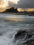 View of Bamburgh Castle at Sunset, UK Fotografie-Druck von David Clapp