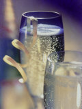 Champagne in Glasses with Ribbon and Bottle Behind Photographie par Eric Kamp
