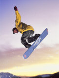 Man on Snowboard in Mid-Air Photographic Print by Rob Gracie